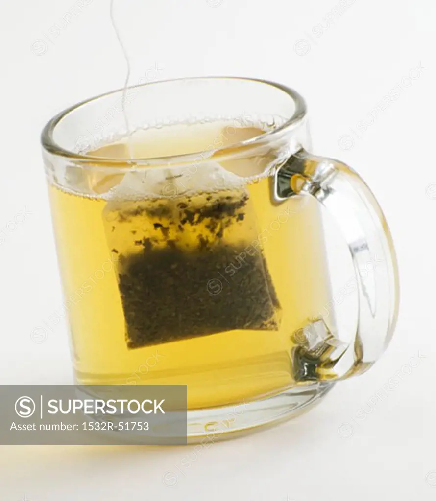 Glass Mug of Green Tea with Tea Bag