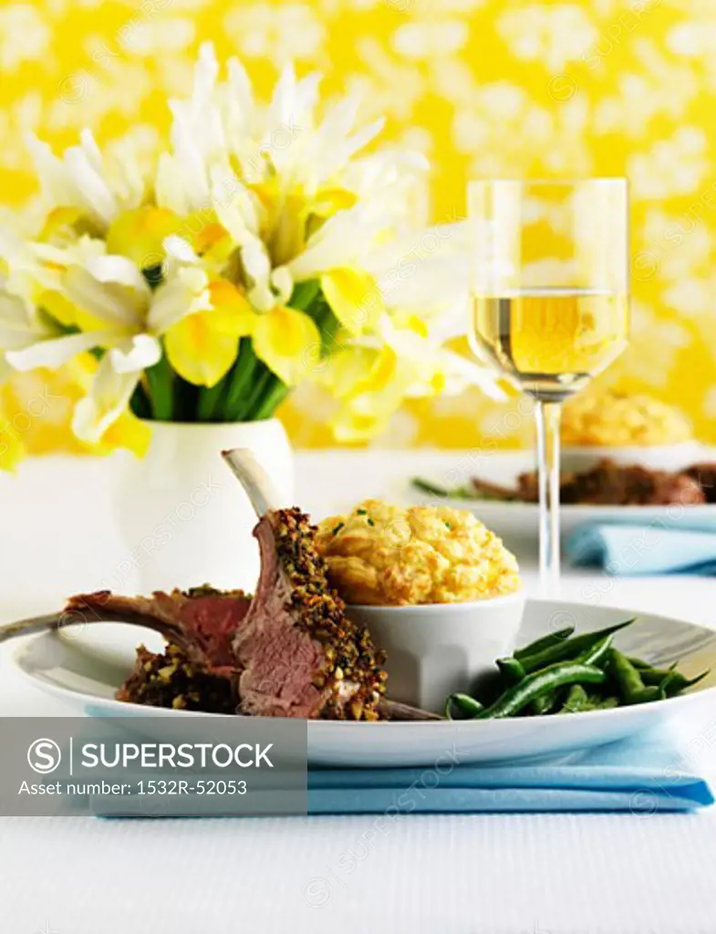 Lamb chops with cheese soufflé and beans