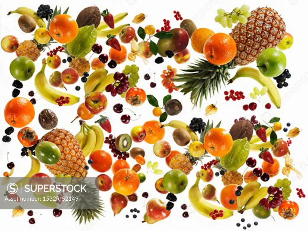 Many different types of fruit against white background