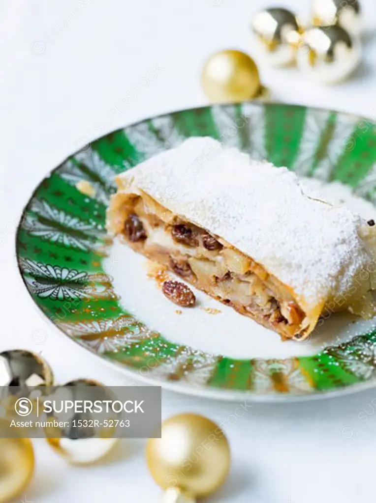 Apple strudel dusted with icing sugar (Christmas)