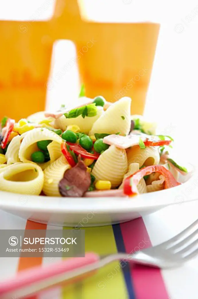 Conchiglie with sweetcorn, peas, peppers and ham