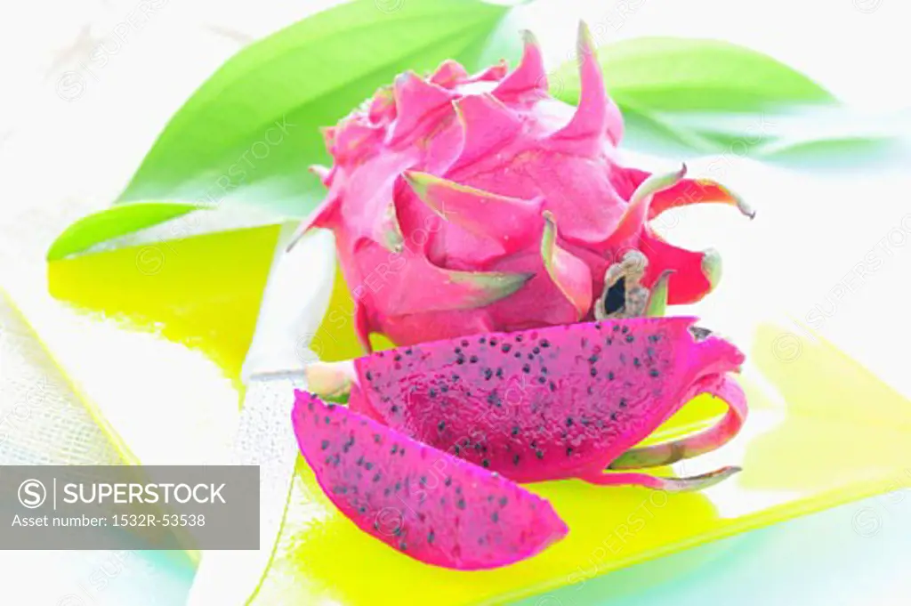 Pink-fleshed dragon fruit, whole fruit and pieces