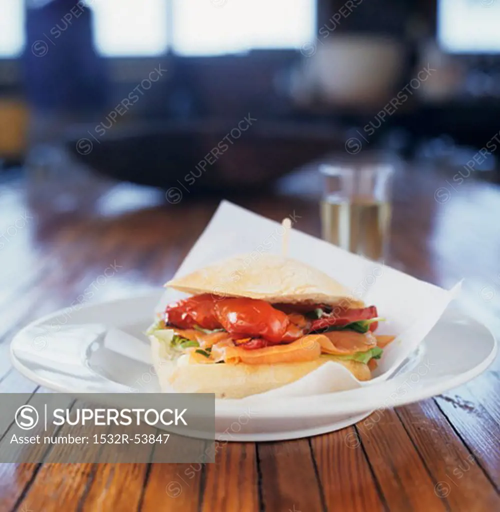 A smoked salmon and roasted red pepper sandwich