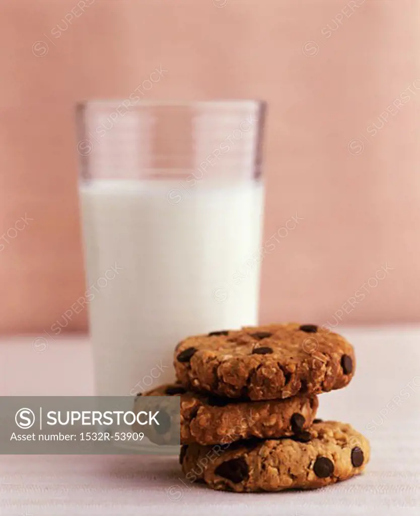 Chocolate chip oat biscuits and a glass of milk