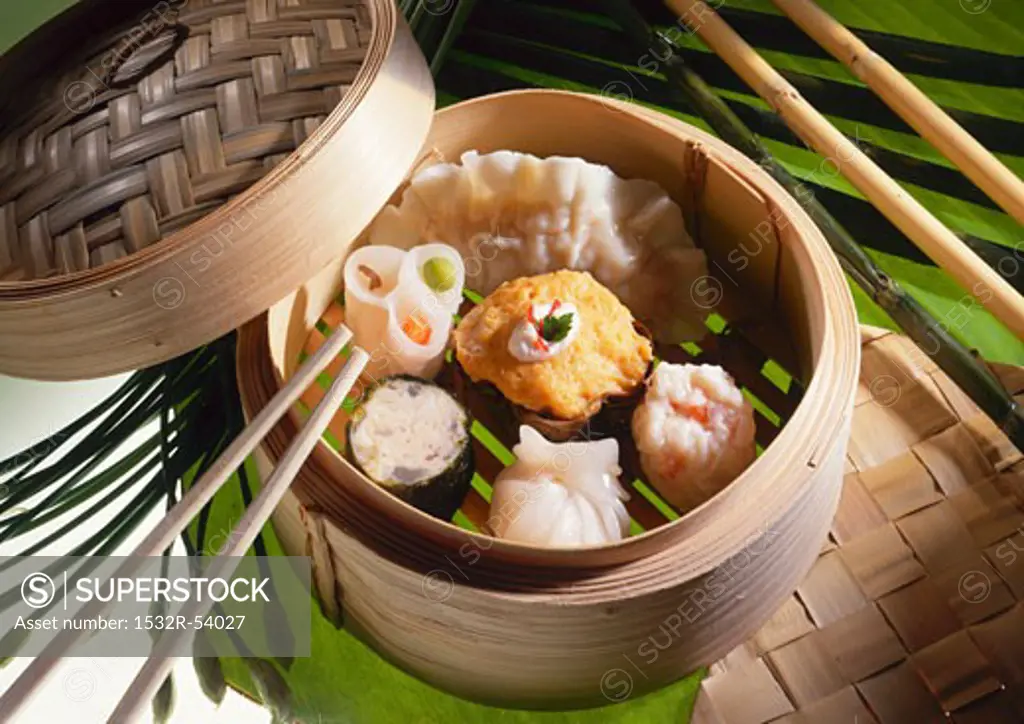 Assorted dim sum in a steaming basket