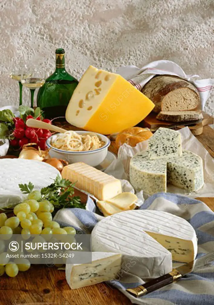 Bavarian cheese specialities with bread, grapes and wine