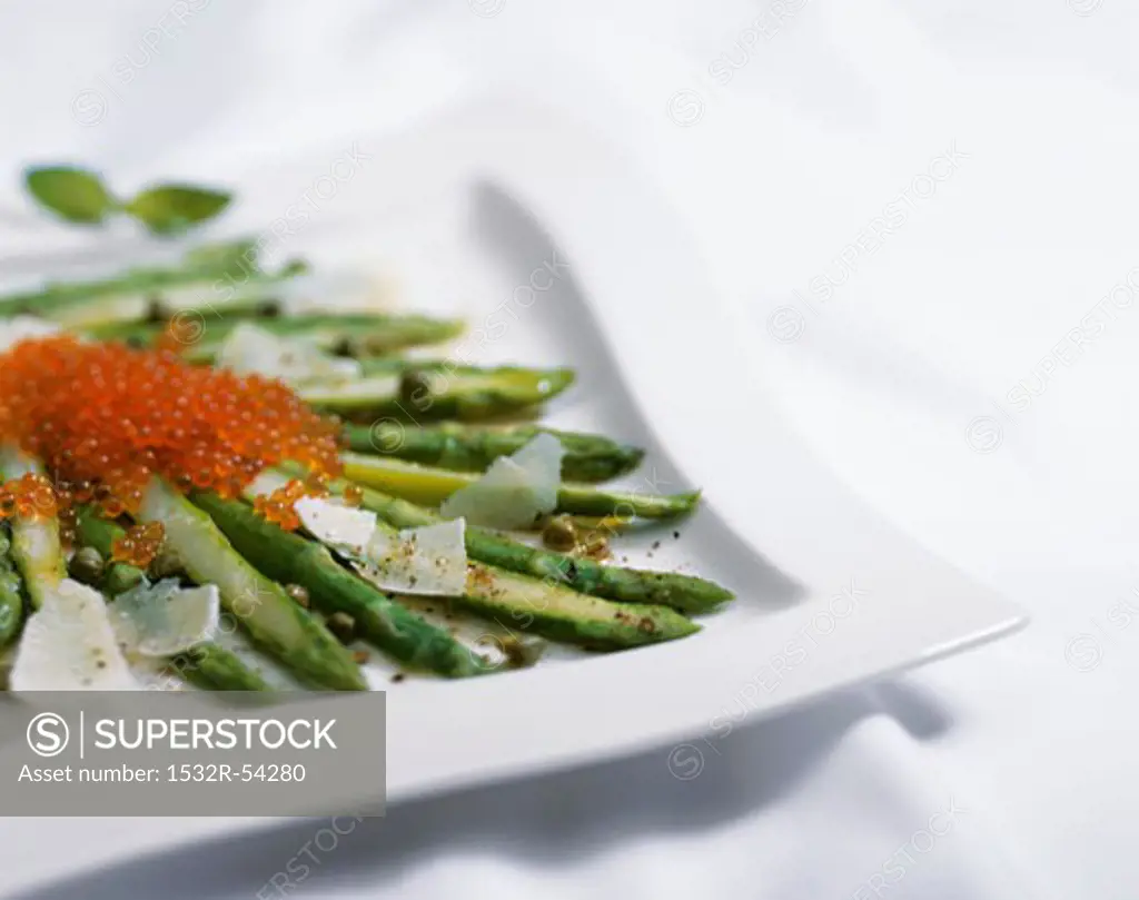 Green asparagus with caviar, capers and Parmesan