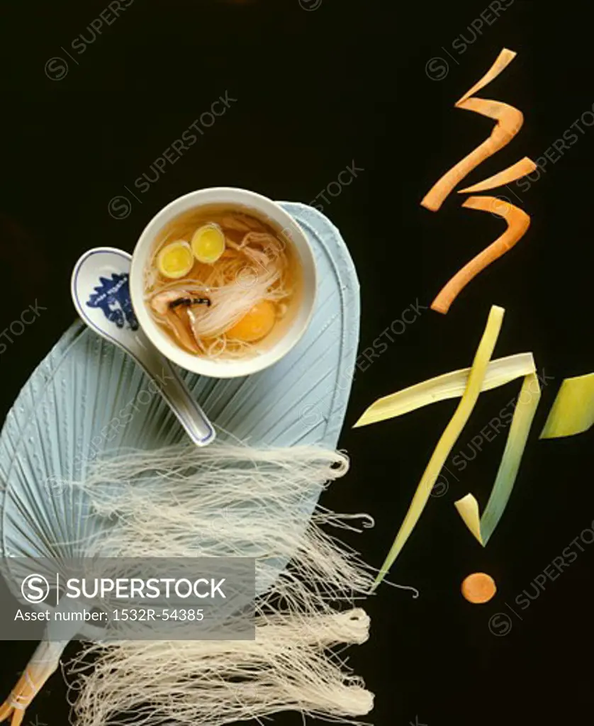 Asian soup with glass noodles and egg