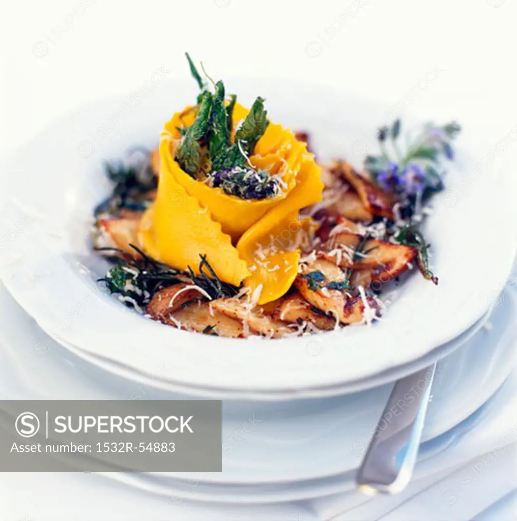 Saffron papardelle on fried cep mushrooms