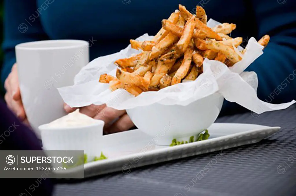 Bowl with chips and mayonnaise