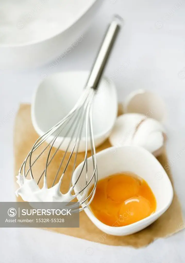Baking ingredients (egg yolk and beaten egg white)