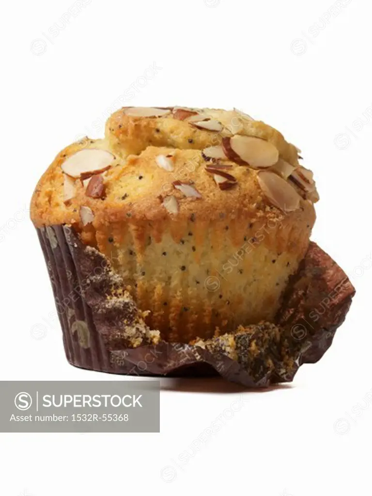 A lemon and poppyseed muffin with slivered almonds