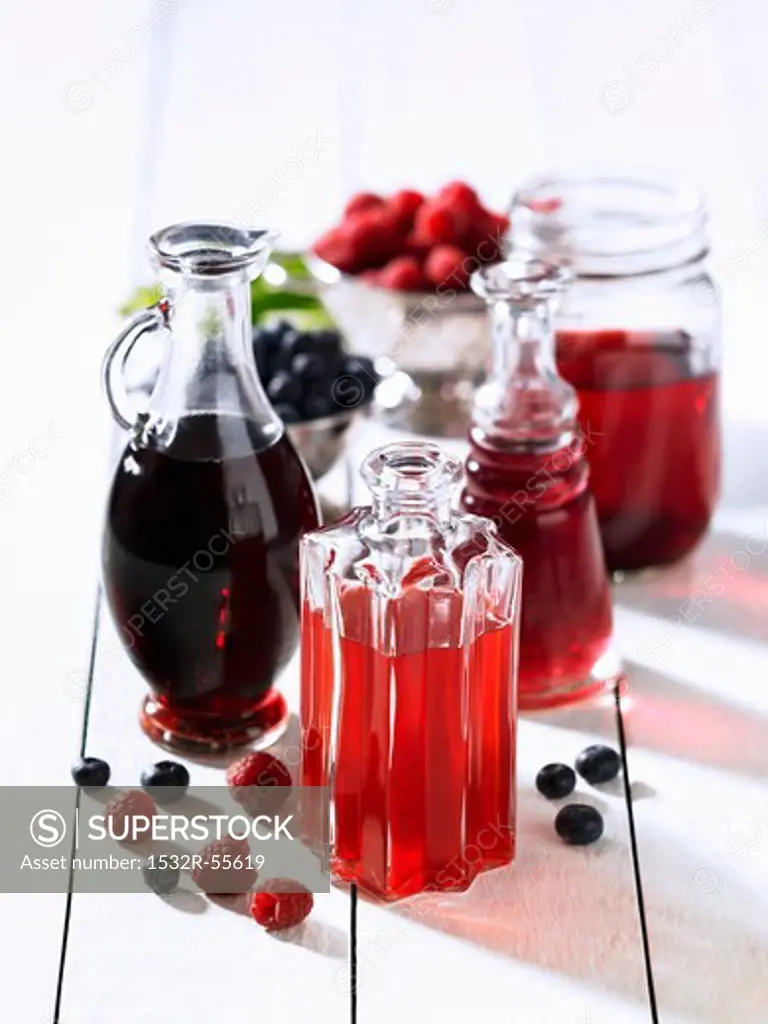Various bottles of berry vinegar