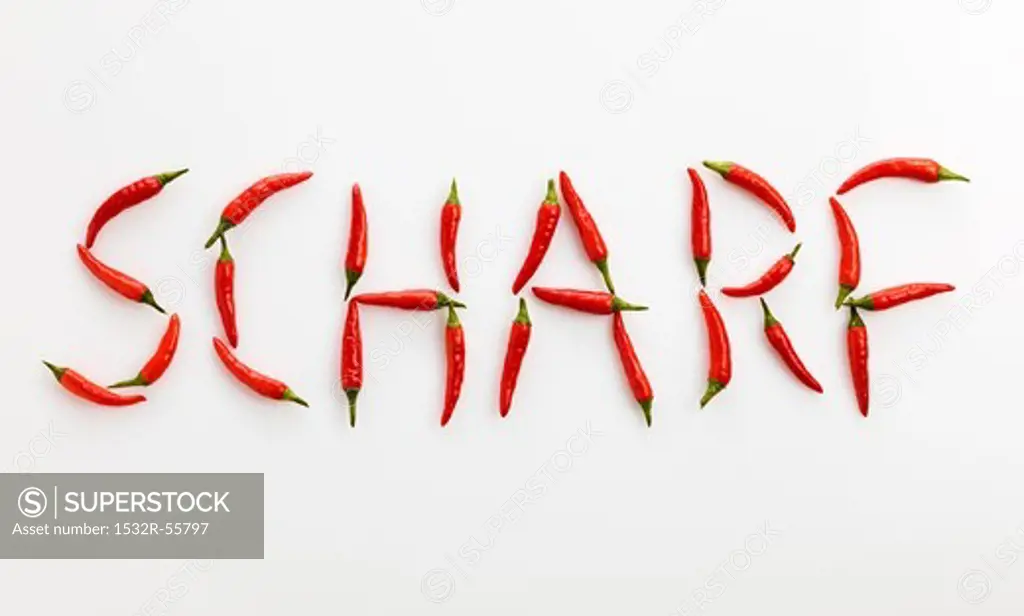 The word 'SCHARF' ('Spicy' in German) written in red chillies