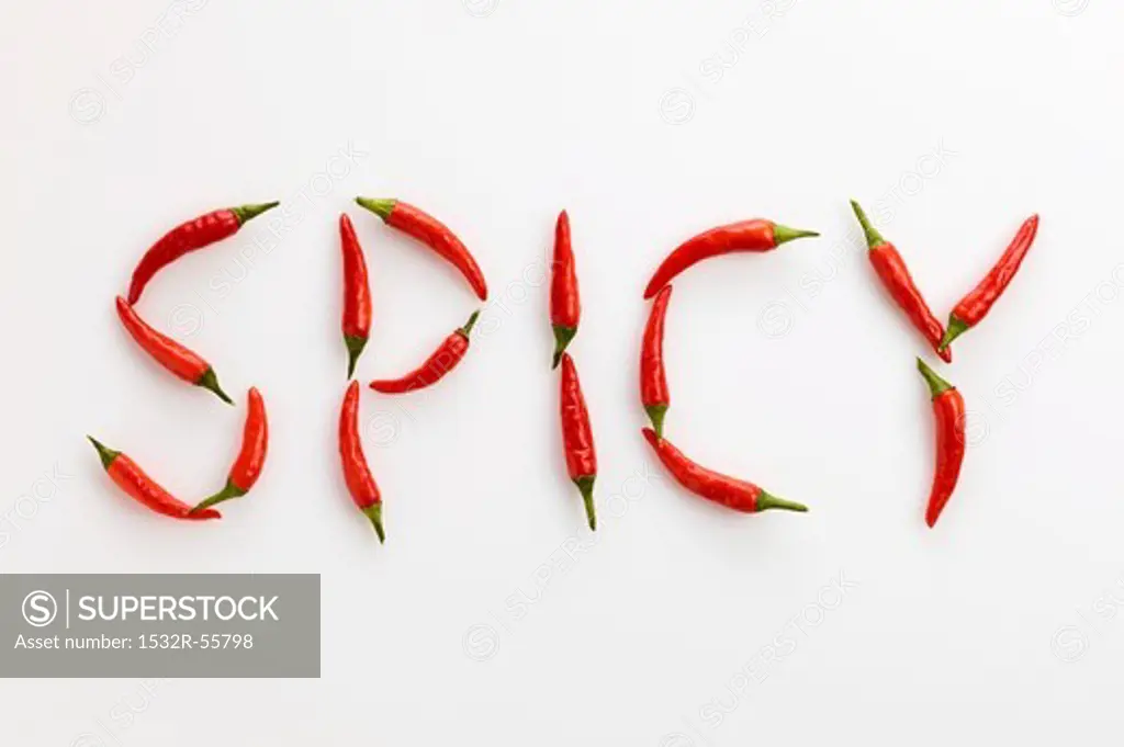 The word 'SPICY' written in red chillies