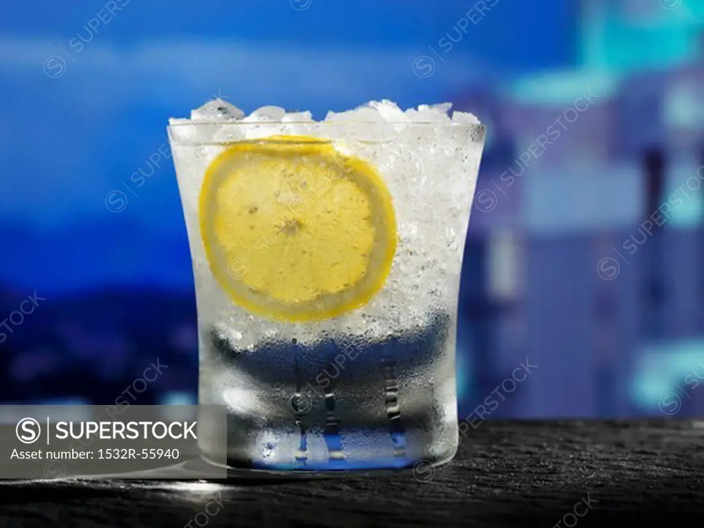 Glass of Water with Crushed Iced and a Slice of Lemon