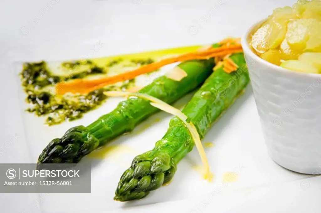 Green asparagus with pesto vinaigrette and a light broth