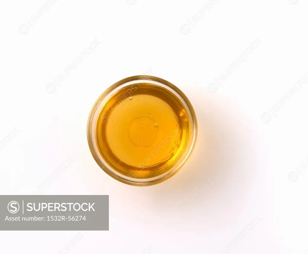 A jar of honey, seen from above