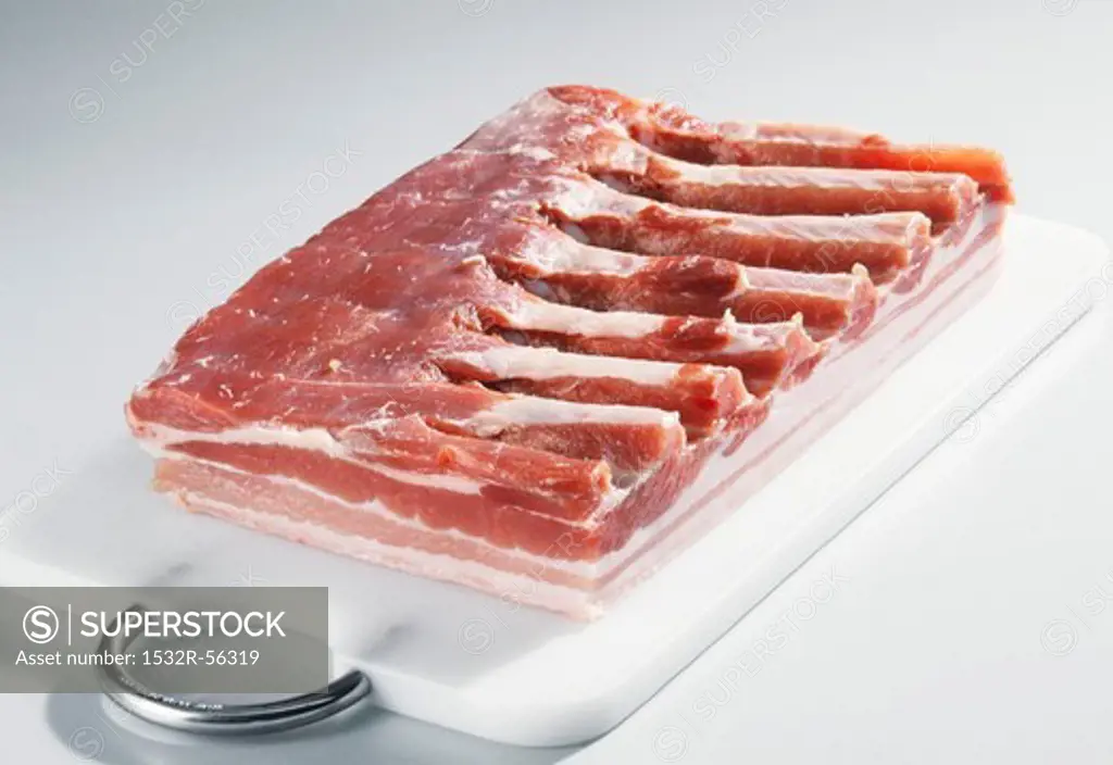 Pork belly on a chopping board