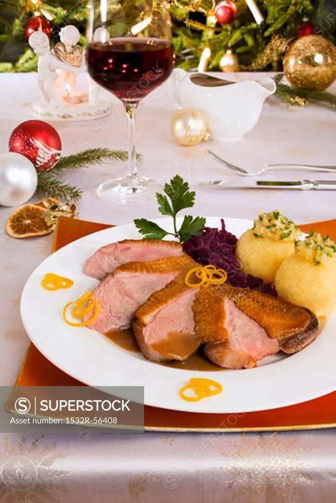 Duck breast with red cabbage and potato dumplings for Christmas dinner