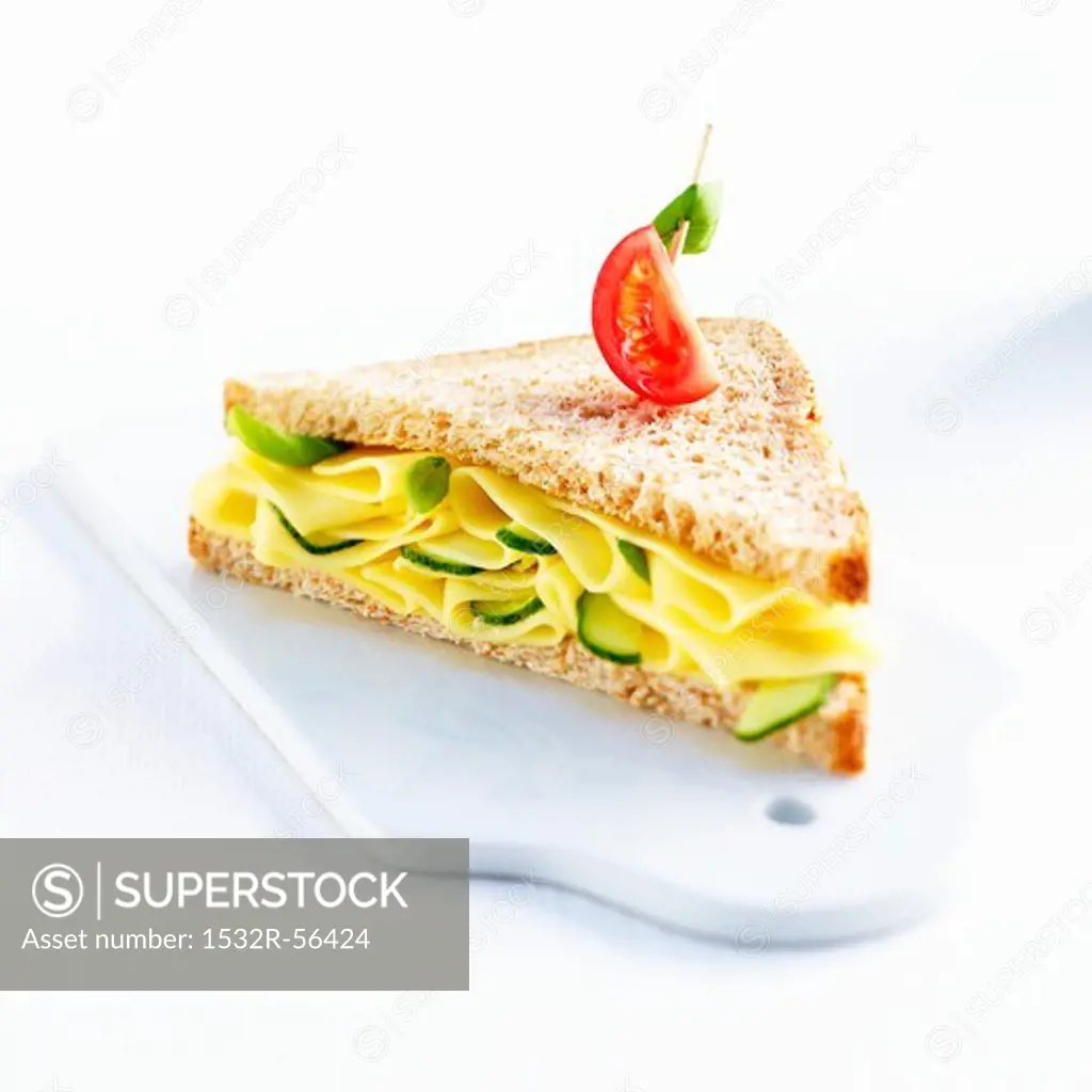 A cheese and gherkin sandwich on wholemeal bread