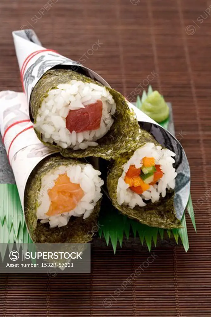 Temaki sushi with tuna, salmon and julieneed vegetables to take away