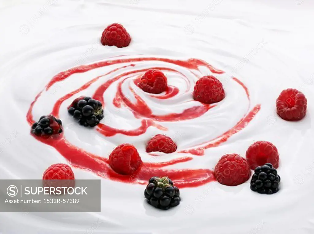 Natural yogurt with raspberries, blackberries and fruit sauce