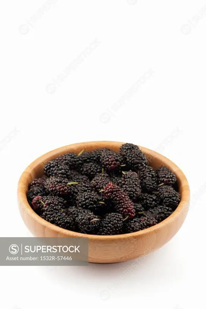 Mulberries in a wooden bowl