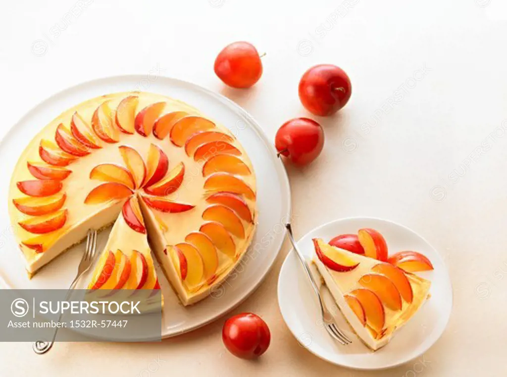 Mascarpone cheese cake with plums, sliced