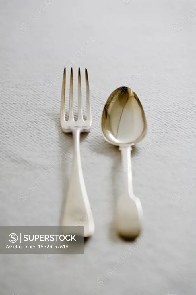 Antique silver cutlery (fork and spoon)