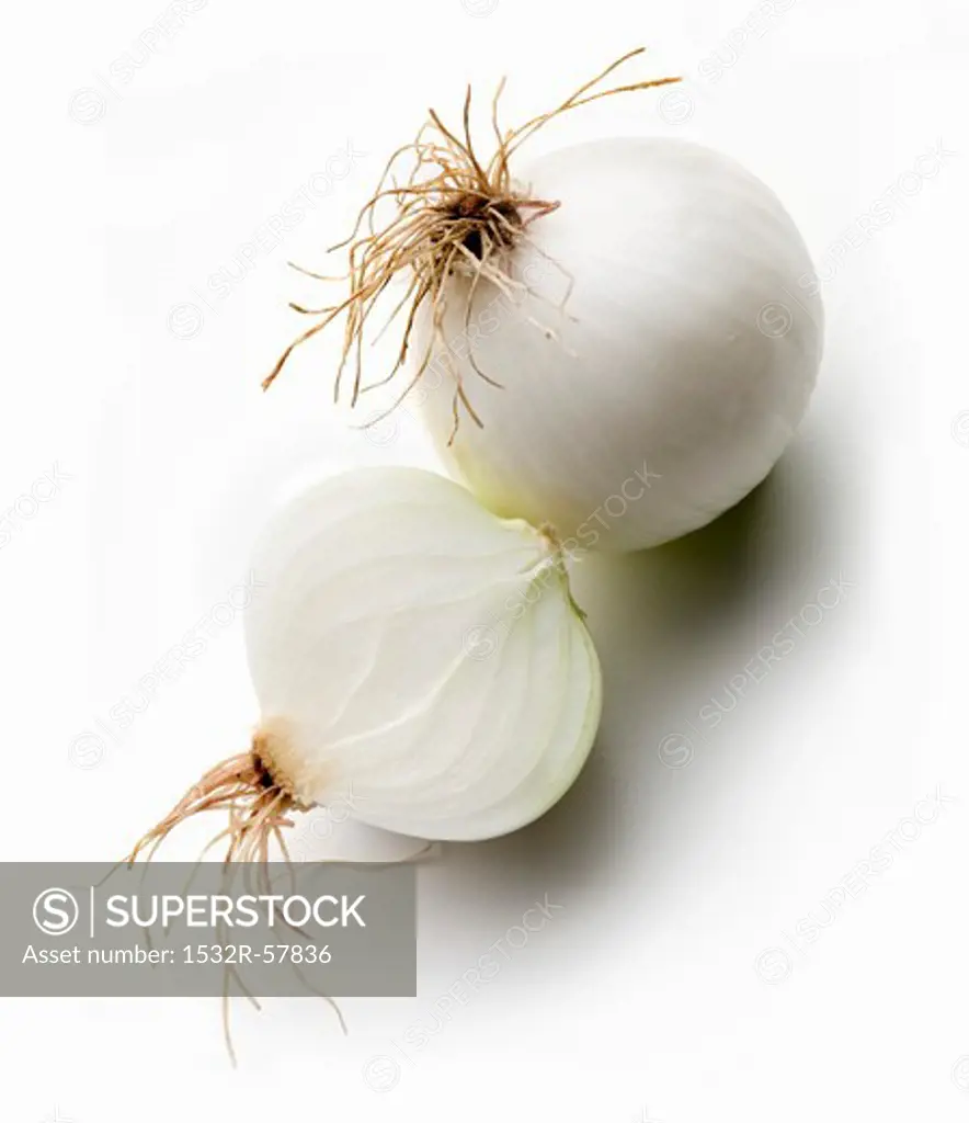 Whole white onion and half an onion