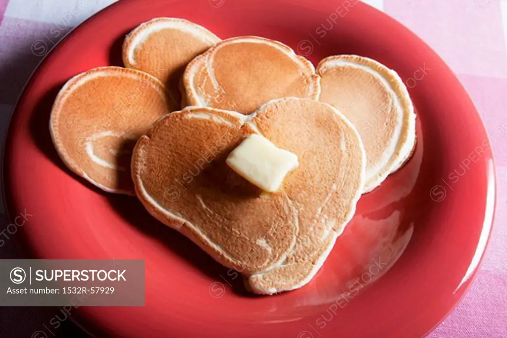 Plate of Heart Shaped Pancakes with Butter