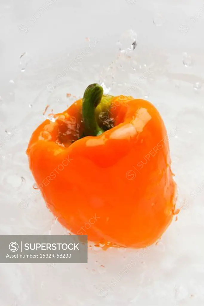 Orange pepper in water