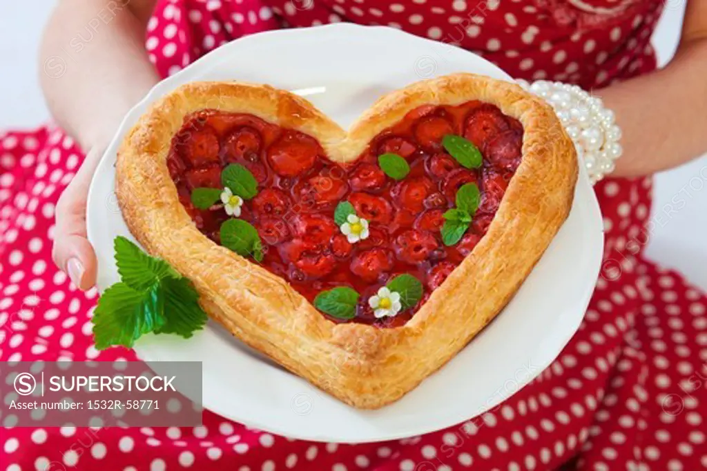 Heart-shaped strawberry puff pastry tart