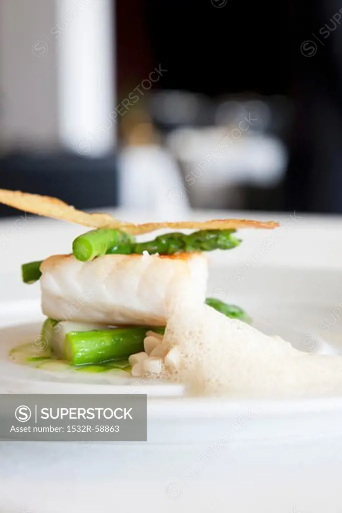 Sea bass with asparagus and crab foam