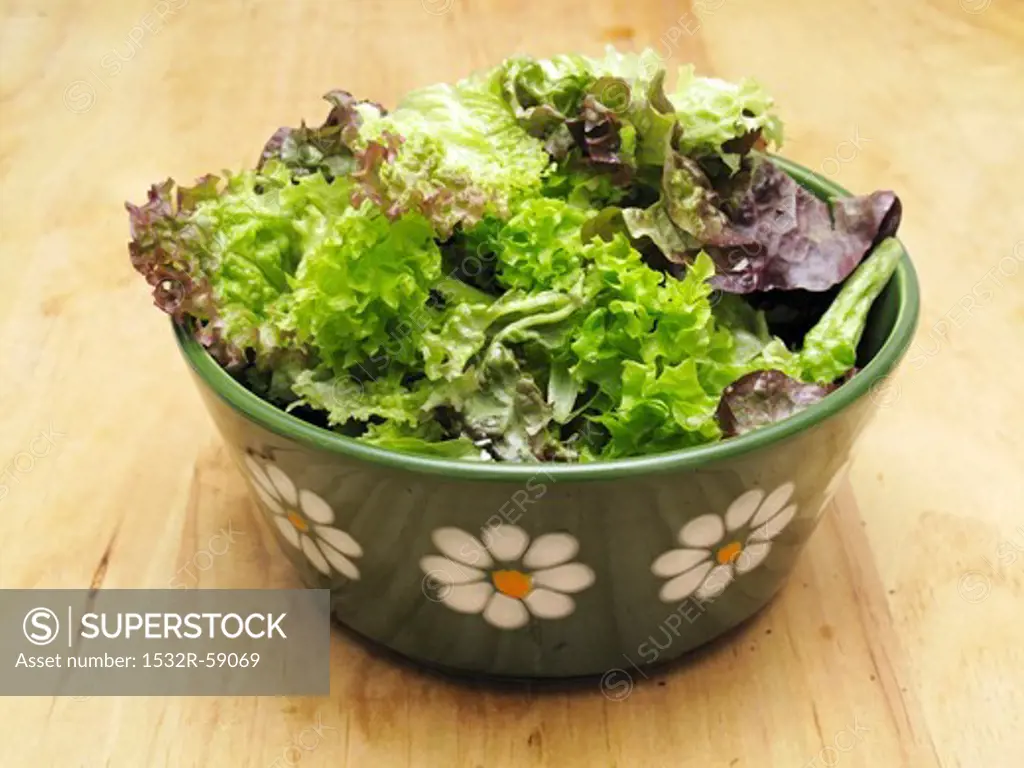 Mixed leaf salad in a ceramic bowl