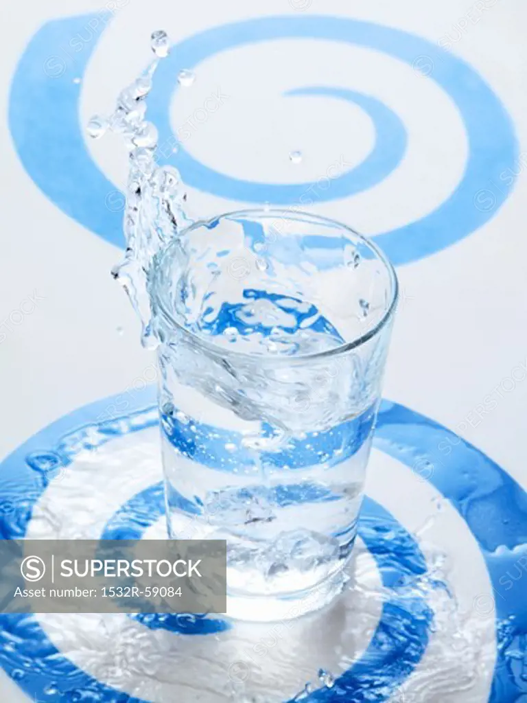Water Splashing into a Glass