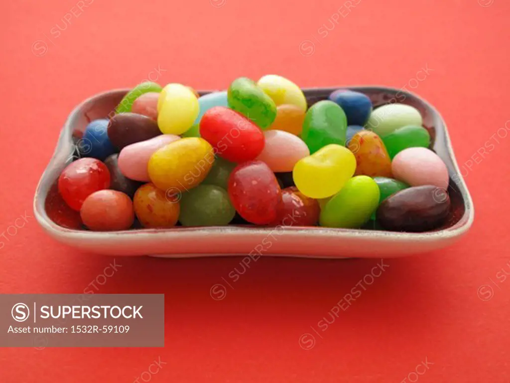 Colourful jelly beans in a ceramic bowl