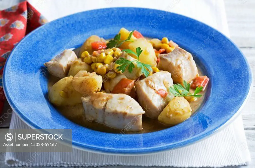 Fish curry with potatoes and sweetcorn