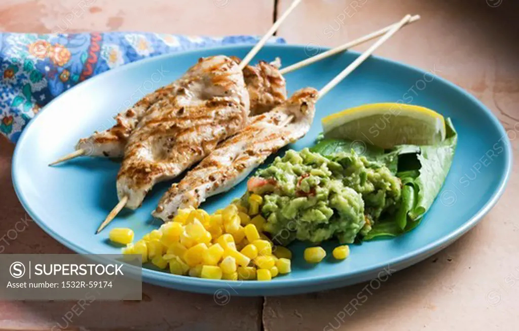 Chicken kebabs with sweetcorn and guacamole