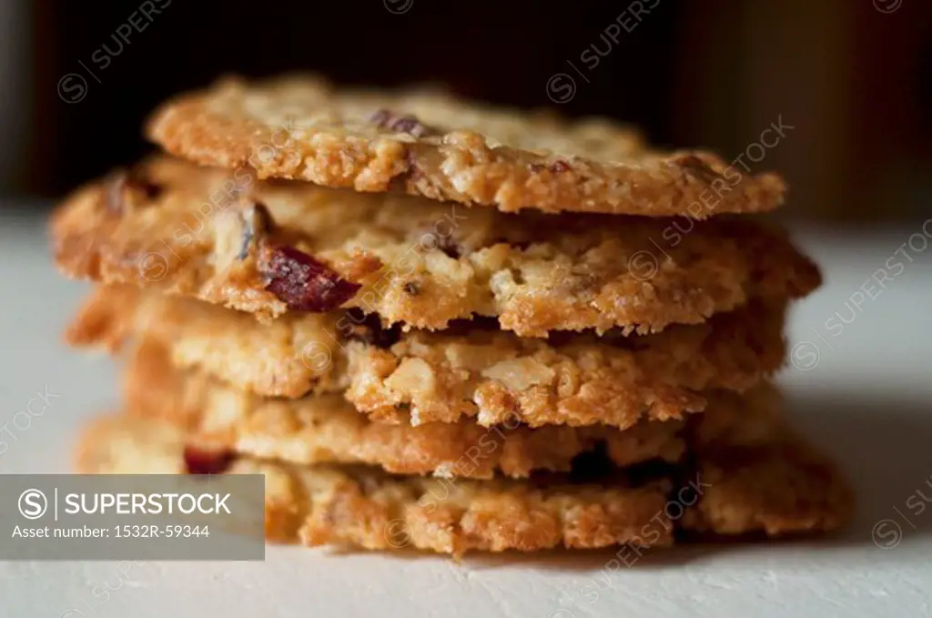 A stack of walnut and cranberry biscuits