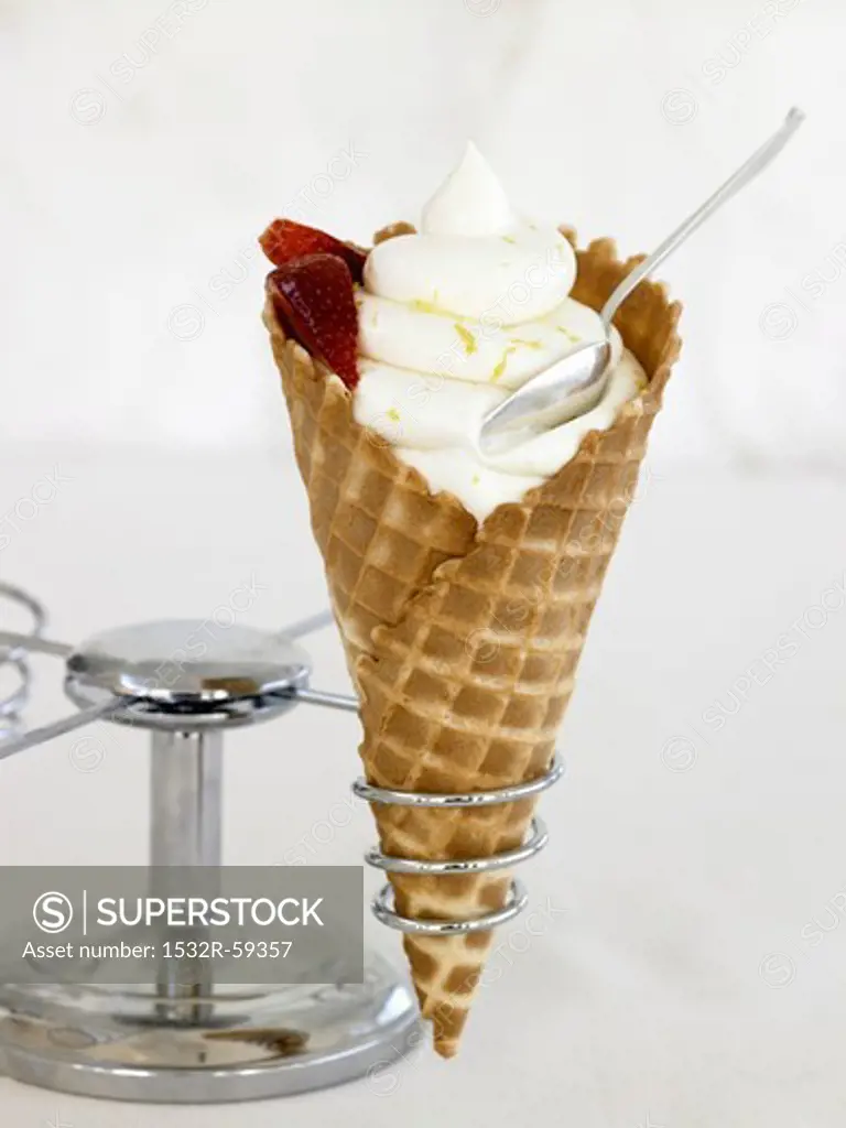 Soft Serve Vanilla Ice Cream in Waffle Cone with Strawberries; In Holder