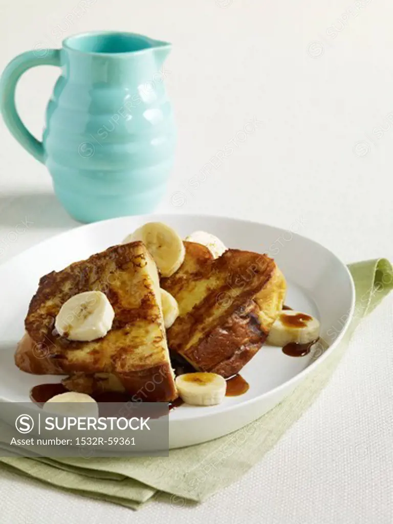 French Toast with Banana Slices and Maple Syrup
