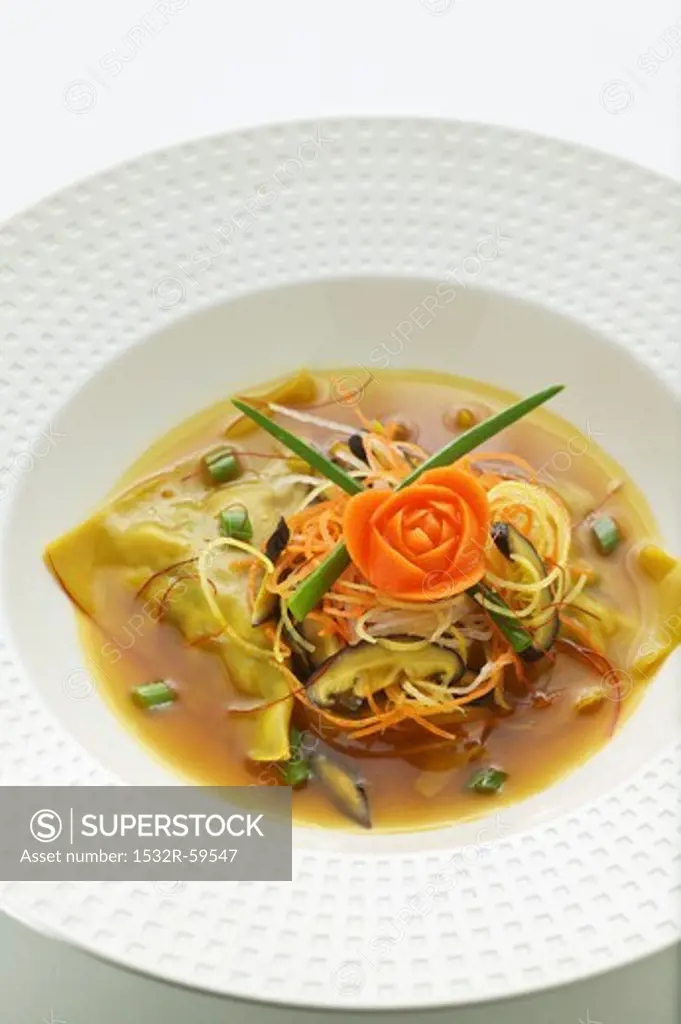 Wonton soup with vegetables and mushrooms (Asia)