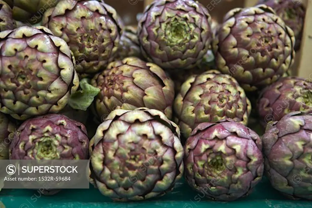 Fresh Stacked Artichokes at the Market
