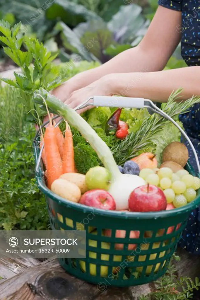 Fresh fruit and vegetables in a basket