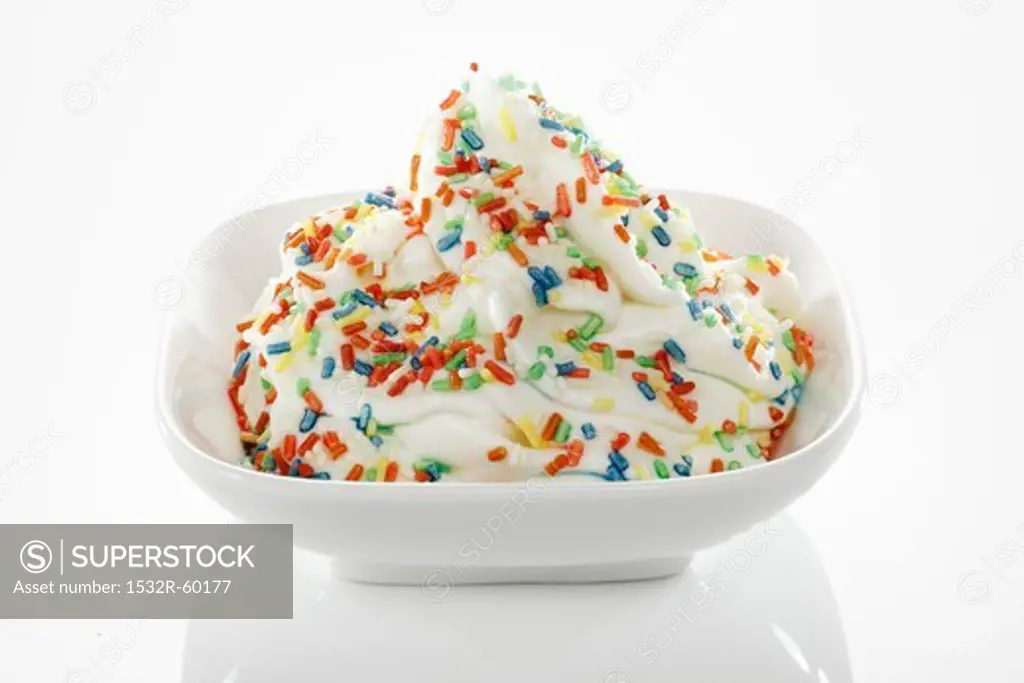 Yogurt ice cream garnished with sugar strands