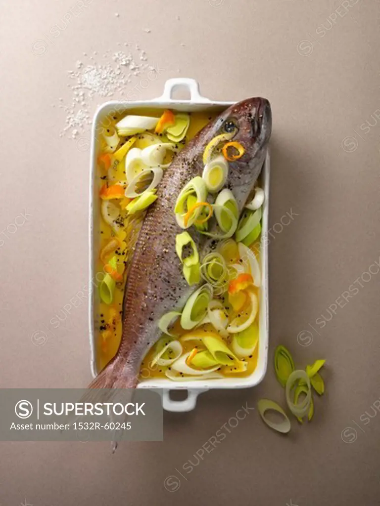 Red snapper with and orange and leek medley, ready to bake