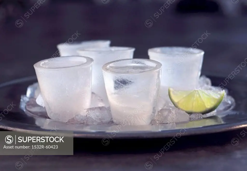 Frozen Vodka Shots on a Tray with Lime