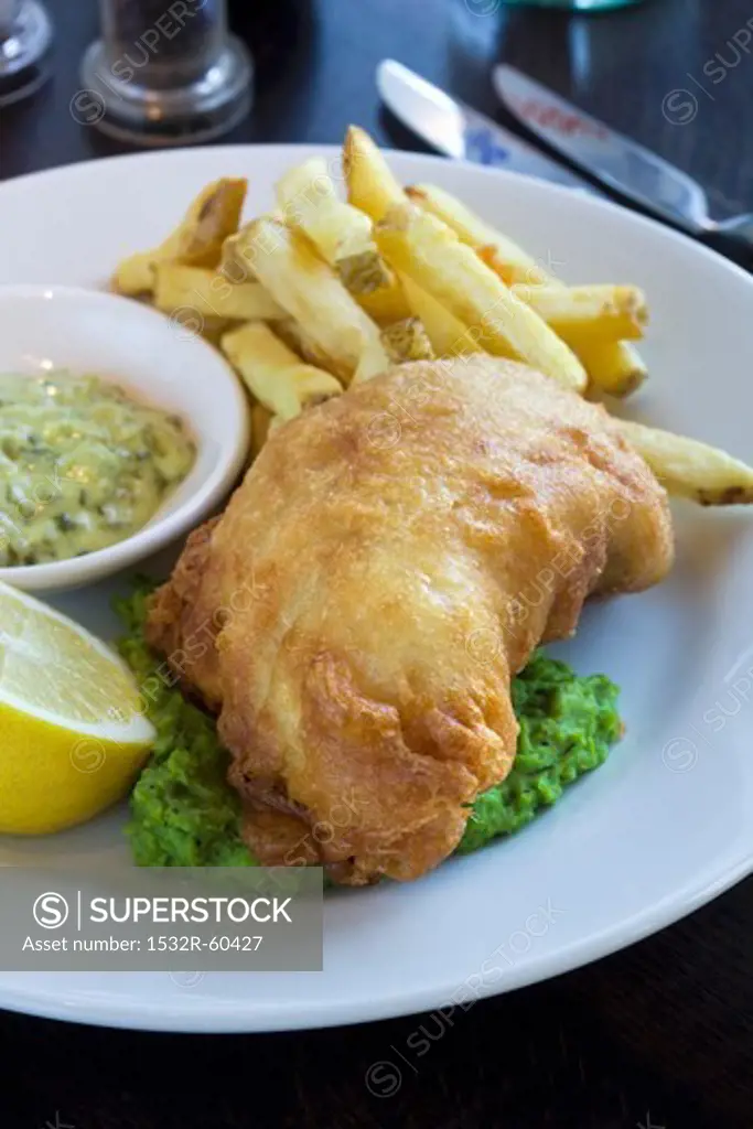 Fish and chips with mushy peas and tartar sauce